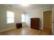 Bright bedroom with natural light, wood floors, and neutral color scheme create an inviting space at 304 Ramblewood Dr, Raleigh, NC 27609