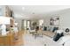 Spacious living room featuring hardwood floors, fireplace, and lots of natural light at 304 Ramblewood Dr, Raleigh, NC 27609