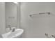Clean bathroom with modern sink, mirror, and towel rack at 3101 Sawyers Mill Dr, Apex, NC 27539