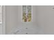 Elegant bathroom with a large bathtub, stylish mural, and modern fixtures at 3101 Sawyers Mill Dr, Apex, NC 27539