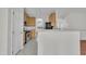 Open kitchen with stainless steel appliances and views to the dining and living room at 3101 Sawyers Mill Dr, Apex, NC 27539