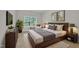 Serene main bedroom with a large window, modern decor, and comfortable furnishings at 3101 Sawyers Mill Dr, Apex, NC 27539