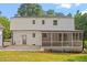 Back of the house with a patio and screened-in porch at 3129 Merrianne Dr, Raleigh, NC 27607