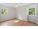 Bedroom featuring a ceiling fan, and natural light from two windows at 3129 Merrianne Dr, Raleigh, NC 27607