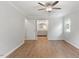Primary bedroom showing hardwood floors and ensuite bathroom at 3129 Merrianne Dr, Raleigh, NC 27607