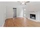 Living room features hardwood floors, fireplace, and access to outdoor space at 3129 Merrianne Dr, Raleigh, NC 27607