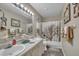 Bathroom featuring double sinks, a decorative mirror, and a shower with a decorative curtain at 320 Bainbridge Cir, Garner, NC 27529