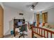 Bedroom featuring a ceiling fan, carpeted floors, and a desk with chairs at 320 Bainbridge Cir, Garner, NC 27529