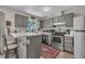 This kitchen features stainless steel appliances, plenty of cabinet space and a breakfast bar at 320 Bainbridge Cir, Garner, NC 27529