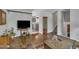 Spacious living room featuring hardwood floors, neutral walls, and open access to other rooms at 320 Bainbridge Cir, Garner, NC 27529