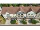 Aerial view of townhome exteriors featuring brick and vinyl at 341 View Dr, Morrisville, NC 27560