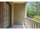 Relaxing balcony featuring wooded views and a neutral color palette at 341 View Dr, Morrisville, NC 27560
