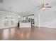 Open floor plan featuring hardwood floors and a view of the modern kitchen at 341 View Dr, Morrisville, NC 27560