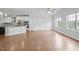 Expansive living area showcasing hardwood floors, recessed lights, modern appliances, and a seamless flow at 341 View Dr, Morrisville, NC 27560