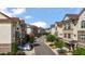 Inviting street view showcases rows of townhomes with well-maintained landscaping and tree-lined street at 341 View Dr, Morrisville, NC 27560
