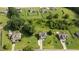 Home's location in the neighborhood, featuring its large lot, landscaping, and surrounding homes at 3525 Daisy Ln, Wake Forest, NC 27587