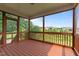 Inviting screened porch features wood flooring with views of the beautiful outdoor landscape at 3525 Daisy Ln, Wake Forest, NC 27587