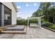 Backyard patio featuring a hot tub and a charming swing set for outdoor enjoyment at 3829 Sleepy Brook Ln, Apex, NC 27539