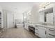 Modern bathroom with a soaking tub, double vanity, and stylish fixtures at 3829 Sleepy Brook Ln, Apex, NC 27539