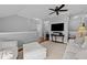 Cozy living room with soft lighting, neutral tones, and inviting seating at 3902 Stags Leap Cir, Raleigh, NC 27612