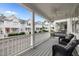 Relaxing front porch with comfortable seating, including a porch swing, overlooking the neighborhood at 3902 Stags Leap Cir, Raleigh, NC 27612