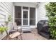 Comfortable screened porch with outdoor seating and a view of the landscaped backyard at 3902 Stags Leap Cir, Raleigh, NC 27612