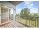 Outdoor porch features wood flooring with a nature view at 404 Panorama Park Pl, Cary, NC 27519