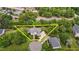 Expansive property with well-maintained landscaping, circular driveway, and mature trees offering ample privacy at 4315 Sugar Pine Ln, Durham, NC 27705