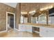 The primary bathroom features a vanity with great lighting, and a separate shower and tub at 4315 Sugar Pine Ln, Durham, NC 27705