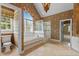 Luxurious primary bath boasts a soaking tub and separate glass shower at 4315 Sugar Pine Ln, Durham, NC 27705