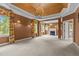 Spacious primary bedroom with a decorative ceiling, fireplace and windows with custom valances at 4315 Sugar Pine Ln, Durham, NC 27705
