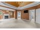 Spacious primary bedroom with fireplace, television and en-suite bathroom at 4315 Sugar Pine Ln, Durham, NC 27705