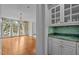 Elegant dining room featuring hardwood floors, chandelier, and ample natural light at 4315 Sugar Pine Ln, Durham, NC 27705