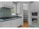 Gourmet kitchen with custom cabinets, granite counters, stainless appliances, and a walk-in pantry at 4315 Sugar Pine Ln, Durham, NC 27705