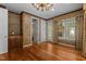 Spacious living room with hardwood floors and ample natural light at 4315 Sugar Pine Ln, Durham, NC 27705