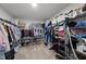 Walk-in closet with ample storage space featuring wire shelving and organized clothing racks at 433 Village Bend Dr, Fuquay Varina, NC 27526