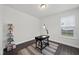 Bright home office features a writing desk, contemporary lighting, and built-in shelving at 433 Village Bend Dr, Fuquay Varina, NC 27526