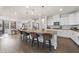 Bright kitchen features an oversized island adjacent to the dining area at 433 Village Bend Dr, Fuquay Varina, NC 27526