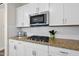 Gourmet kitchen features stainless steel appliances and granite countertops at 433 Village Bend Dr, Fuquay Varina, NC 27526
