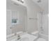Bathroom featuring a white vanity, a mirror, and a tub and shower combination at 4825 Windbreak Ln, Raleigh, NC 27616