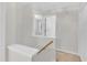 Hallway featuring neutral walls and carpet at 4825 Windbreak Ln, Raleigh, NC 27616