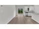 Modern kitchen features stainless steel appliances, granite countertops, and a sliding glass door at 503 Benton Dr, Oxford, NC 27565