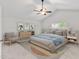 Beautiful bedroom featuring a ceiling fan and a large window for plenty of light at 518 Emerald Downs Rd, Cary, NC 27519