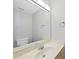 Neutral bathroom featuring large mirror, vanity and sink at 5317 Peacenest Dr, Raleigh, NC 27610
