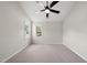 Bedroom with neutral walls, carpeted floors, ceiling fan and bright windows at 5317 Peacenest Dr, Raleigh, NC 27610
