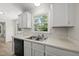 Kitchen sink and window view of outdoors at 5317 Peacenest Dr, Raleigh, NC 27610