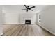 Spacious living room with fireplace and natural light at 5317 Peacenest Dr, Raleigh, NC 27610