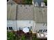 Aerial view of back of townhouses with decks and green landscaping at 5505 Heather Garden Way, Raleigh, NC 27613