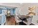 Open floor plan with a dining area that seamlessly connects to the living room at 5505 Heather Garden Way, Raleigh, NC 27613