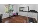 Exercise room with a mirror and exercise equipment at 5505 Heather Garden Way, Raleigh, NC 27613